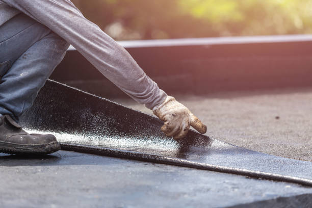 Professional Emergency Waterproofing technician working in Little Falls, MN